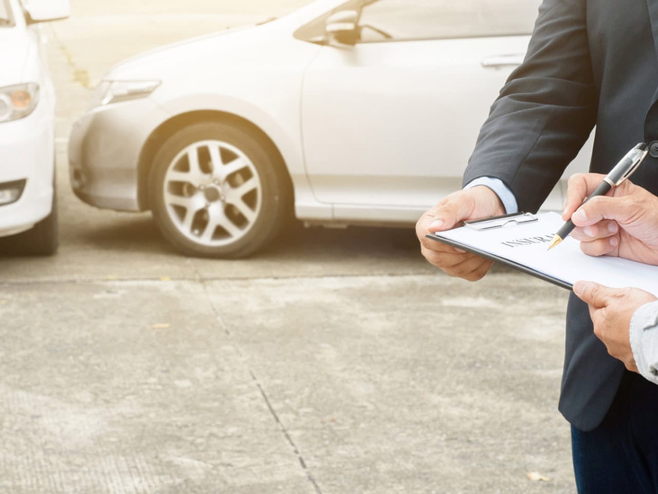 insurance claim after an accident filling out paperwork