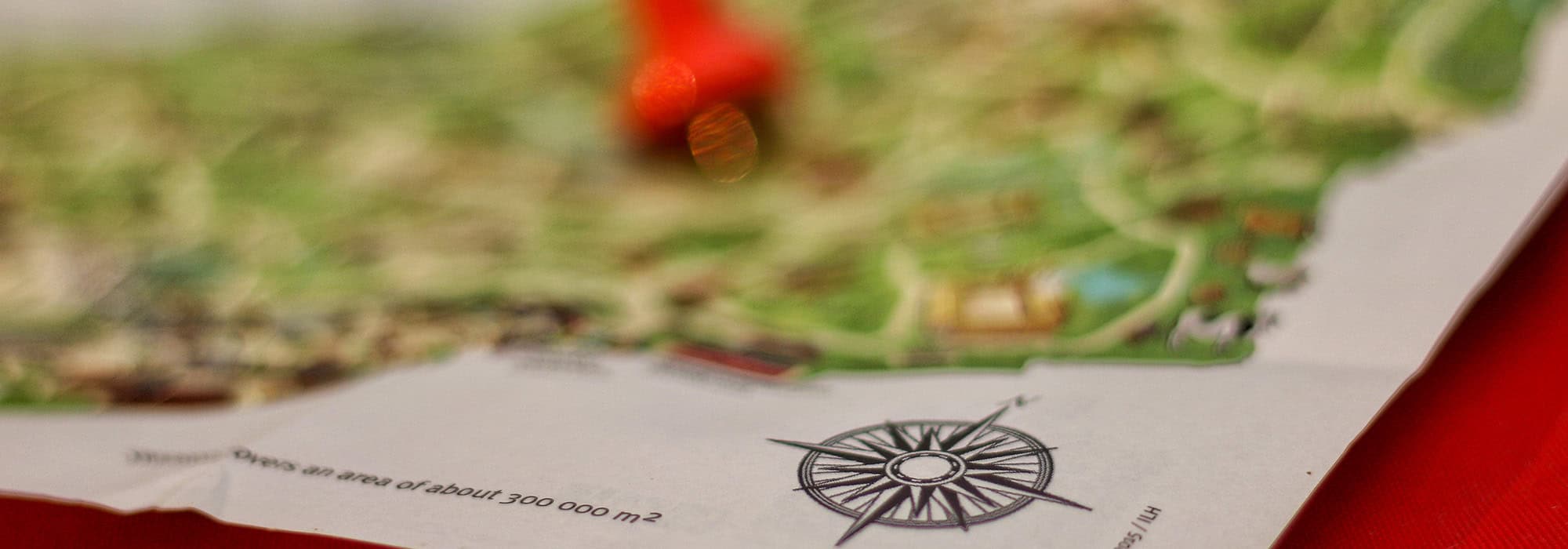pin in a blurry map