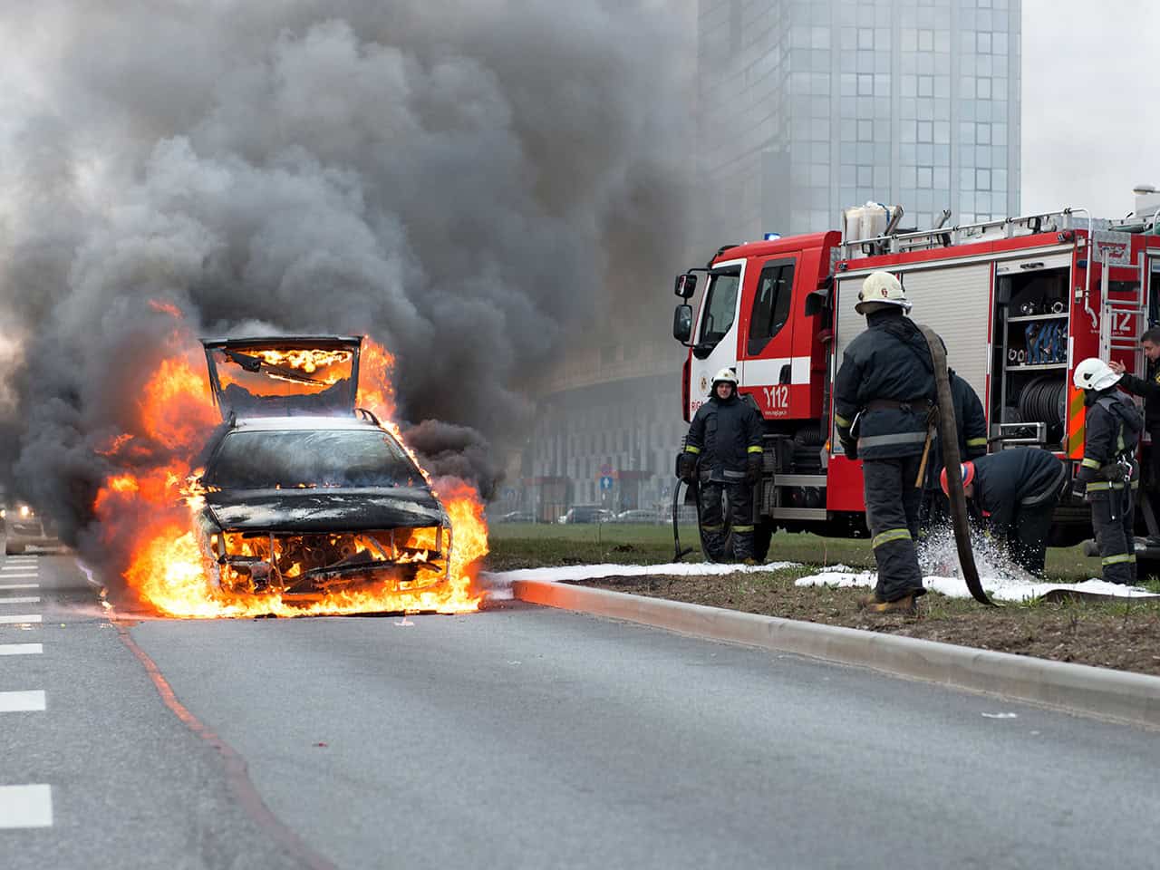 Car on fire after gas tank explosion