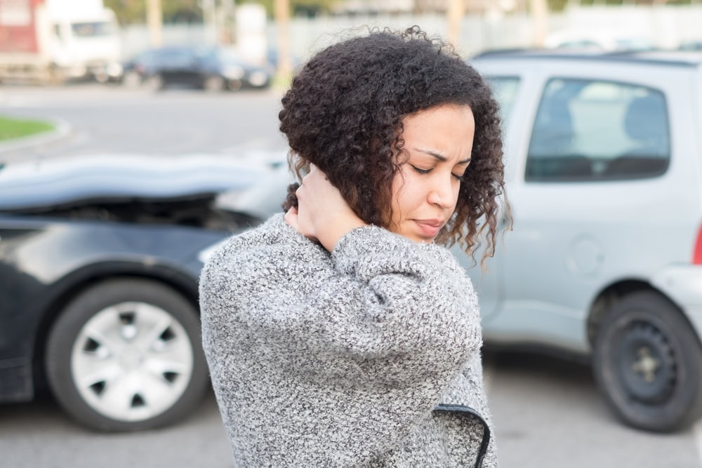 Photo of Woman Holding back of the neck