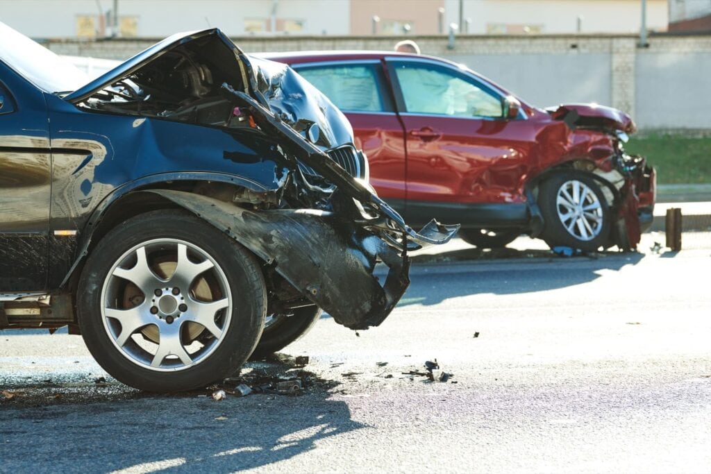 two crashed cars next to each other