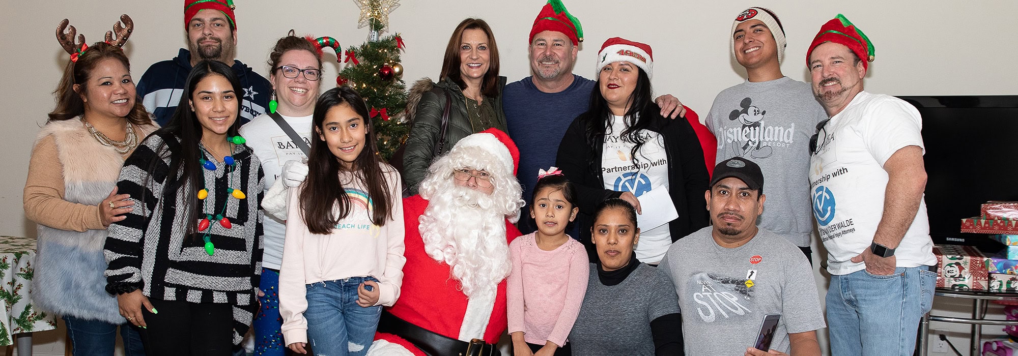Caputo and Van Der Walde play Santa with Bay Area Pay It Forward